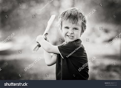 Angry Little Boy Holding Sword Glaring Stock Photo 286631111 Shutterstock