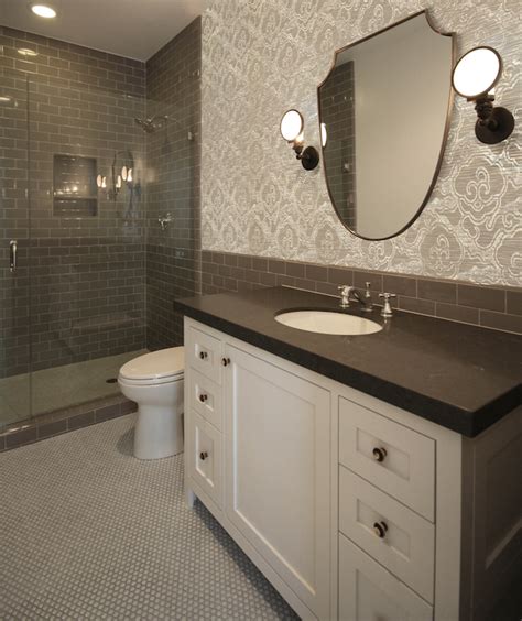 Another way to create some drama in your bathroom by choosing these penny tiles. Dark Gray Subway Tiles - Transitional - Bathroom