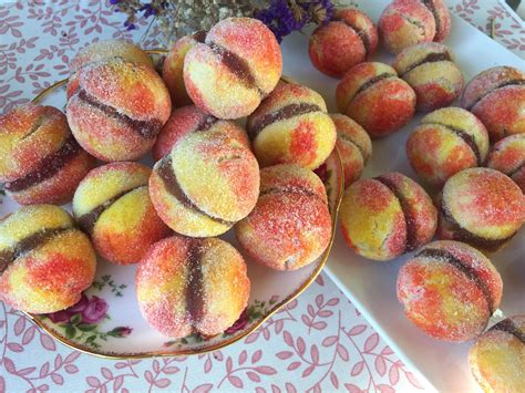 Dip each ball in the alkermes. Homemade Breskvice (Croatian peach cakes) : food