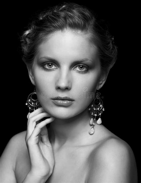 Black And White Portrait Of Young Beautiful Woman On Black Stock Photo