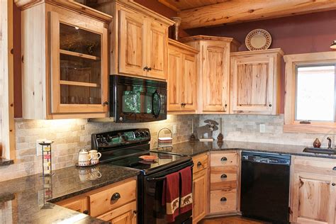 Kitchen backsplash installation with floor & decor. Lake Home Kitchen | Cook, MN - Franklin Builders