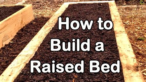 We actually decided to put our raised garden bed on a ring of pavers. How to Build a Raised Garden Bed with Wood - Easy (EZ) & Cheap