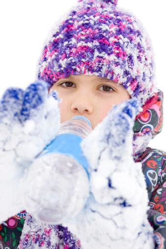 Girl Drink Water In Winter Park Stock Photo Download Image Now