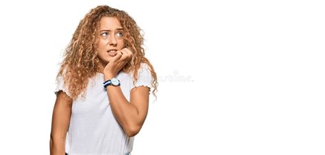 Beautiful Caucasian Teenager Girl Wearing Casual White Tshirt Looking Stressed And Nervous With