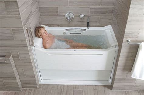 Kohlers Walk In Bathtub Features A Sliding Wall That Makes Getting