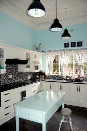 An island is usually the focal consider painting the cabinetry black with white accents for a chic look that doesn't break the bank. Pin by Liezl Botha on For the house | Black kitchen decor ...