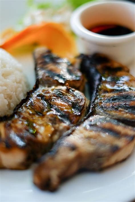 Mix soy sauce, lemon and pepper in a bowl. Healthy Food: Steak Fish Rice And Soy Sauce On A Plate Close-up Stock Image - Image of dish ...