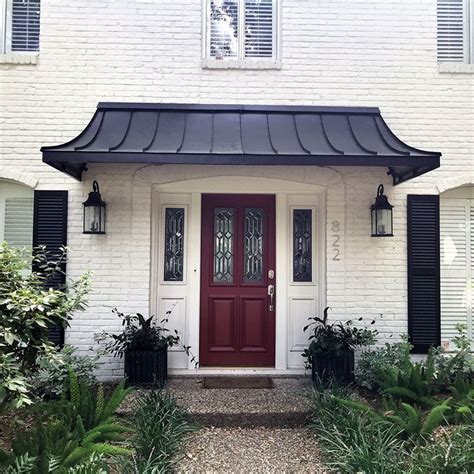 The Classic Black Metal Awning With The Single S Scrolls Awnings