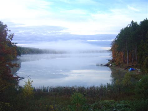 gaylord mi foggy morning on dixon lake photo picture image michigan at city