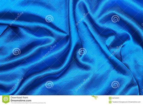 Curved Design On Blue Silk For Pattern And Background Stock Image