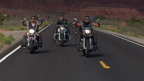three bikers on desert highway mesas behind stock footage sbv 300147927 storyblocks