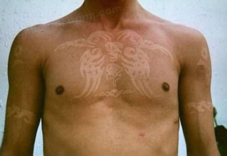Why use ink when you can use the sun? 10 Coolest Suntan Tattoos - tan tattoos, suntan tattoos ...
