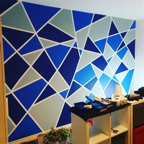 See more ideas about wall paint designs, geometric wall paint, diy wall painting. Geometric frog tape blue and grey wall, painted with ...