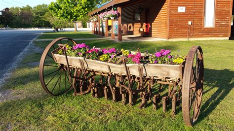 Old Farm Implement As A Planter Rustic Landscaping Front Yard Rustic