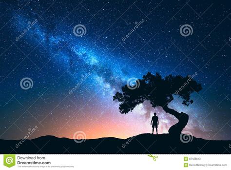 Milky Way Tree And Silhouette Of Alone Man Night Landscape Stock