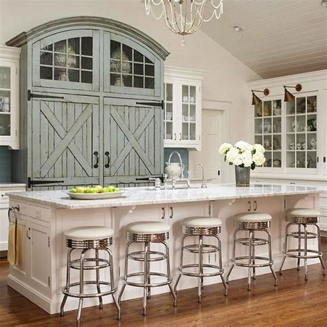 Barn doors are not just for country farms anymore. barn door style cabinets in a kitchen | Kitchens | Pinterest