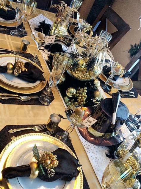 dining delight new year s eve gold and black tablescape new years eve table setting new years