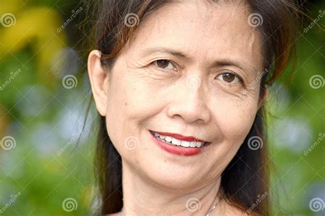 an older filipina female senior smiling stock image image of smiling aging 157703211