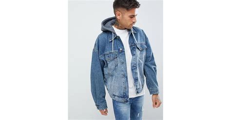 Asos Oversized Denim Jacket With Jersey Hood In Mid Wash In Blue For