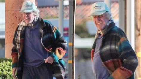 Gary Busey Appears To Discharge Himself In Public While Pulling Down