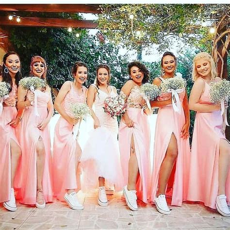 A Group Of Bridesmaids Posing For A Photo