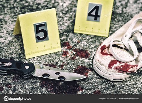 Crime Scene Investigation Bloody Knife And Victims Shoes With
