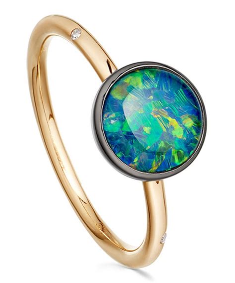 The innermost rings are narrow and dark, and its outermost rings are brightly colored. Opal Uranus Ring | Liberty London