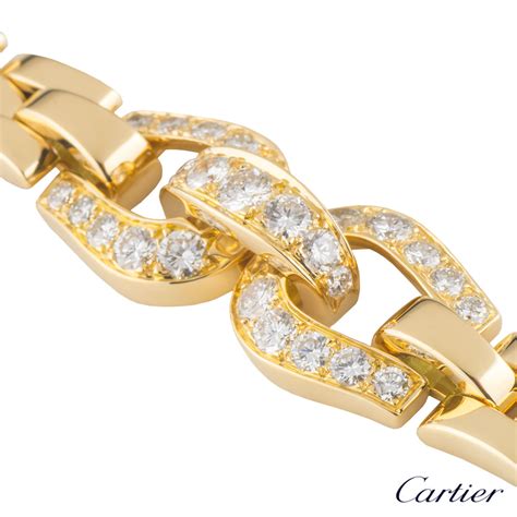 Each design offers singular character, while each diamond exudes true radiance. Cartier Yellow Gold Diamond Etrier Bracelet N6001500 ...