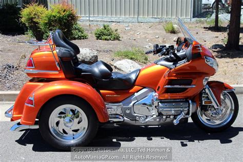 I would start by removing the spark plugs, examining them, pouring a bit of marvel mystery oil in each cylinder and putting new plugs in. 2002 Honda Goldwing GL1800 Trike for sale . Motorcycle for sale.