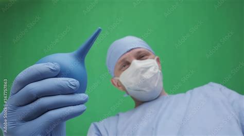 Video Stock A Physician With An Enema A Doctor With An Enema In His