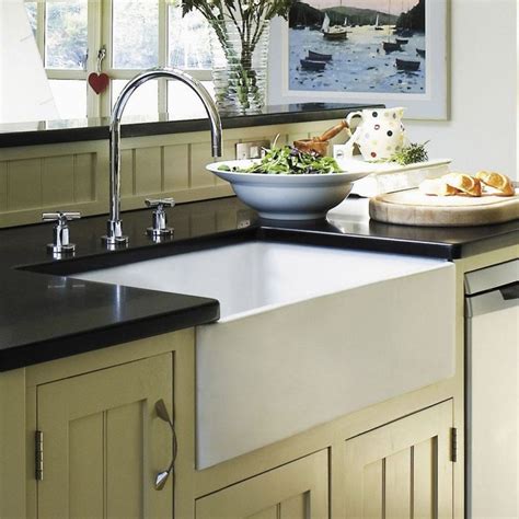 The term farmhouse kitchen sink tends to be a little misleading. Installing A Farmhouse Kitchen Sink | Farmhouse sink ...