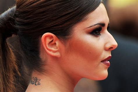 What Are Cheryl S Tattoos When Did She Get Roses Inked On Her Bum And