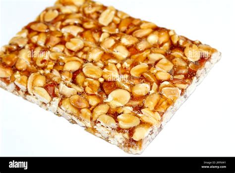 Peanut Brittle Isolated On White Background Stock Photo Alamy