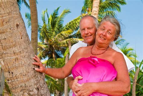 Mature Couple Walking On Beach Stock Image Image Of Male Activity