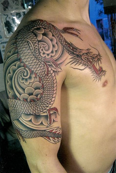 2 dragon head tattoos on hands. Dragon Shoulder Tattoo Designs, Ideas and Meaning ...