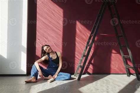 Warm Sunlight Goes Through The Windows Young Housewife Decided To Glue Wallpaper In Her New