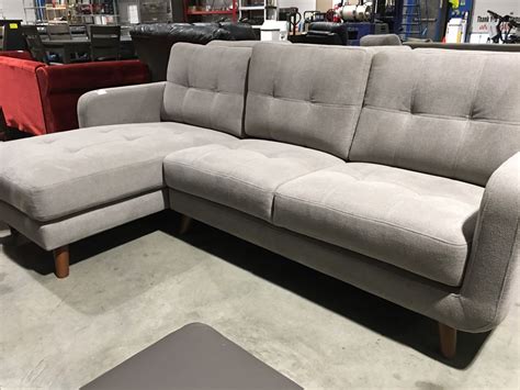 Add a corner sofa to the actual corner of the room, or stylize one in the middle of your space to leave the walls free for other furniture. "L" SHAPED GREY UPHOLSTERED SOFA - Able Auctions