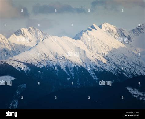 Snowcapped Fagaras Mountains In Romania Stock Photo Alamy