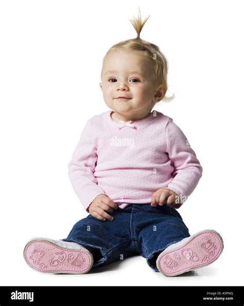 Baby Girl Ponytail Sitting Smiling Cut Out Stock Images And Pictures Alamy