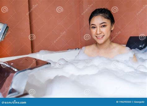 woman relaxing and takes bubble bath in bathtub with foam stock image image of natural girl