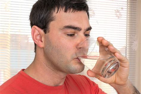 Young Man Drinking Fresh Water Stock Photo Image Of Caucasian Human