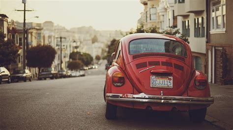Red Volkswagen Classic Beetle Parked On Road Hd Wallpaper Wallpaper Flare