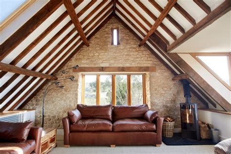 Snug Attic Living Room Of A Renovated Old Barn 600x400