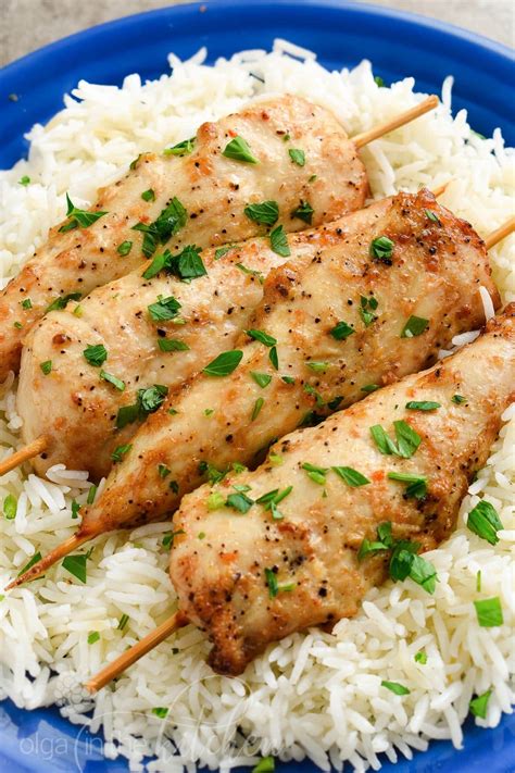 Lay the raw chicken on a baking sheet. Marinated Baked Chicken Tenderloins (VIDEO) - Olga in the ...