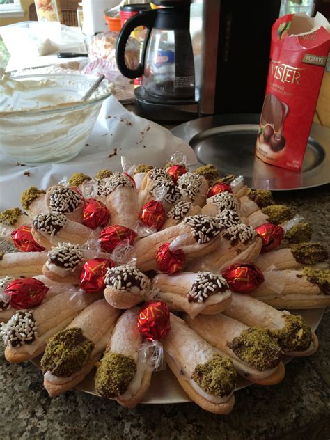 Ladyfingers are lighter, airier finger shaped biscuits. Canoli filling between lady fingers | Table decorations ...