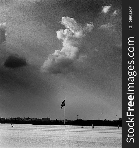 Grayscale Photo Of Flag And Clouds Free Stock Images And Photos