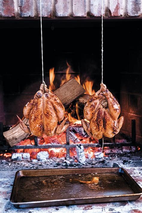 michael symon s fireplace chicken on a string fire cooking grilled chicken recipes fireplace