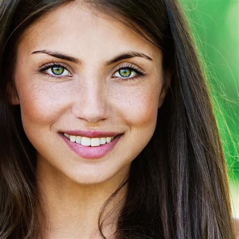 brunette with green eyes girls smiling