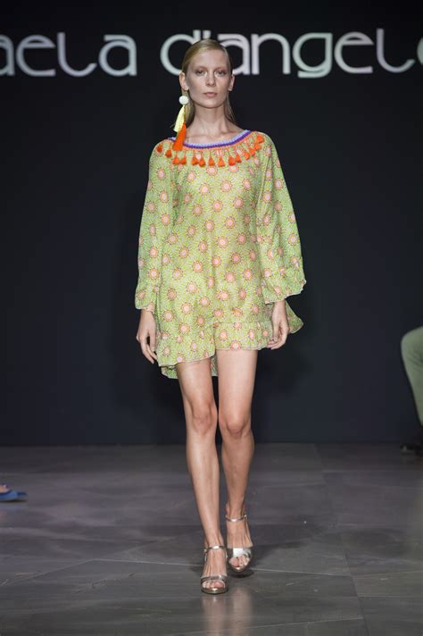 Hands on her head and mouth agape, it was the look of someone who could scarcely believe what she had just achieved. Raffaella D'Angelo spring summer 2017 - Amica Foto 27