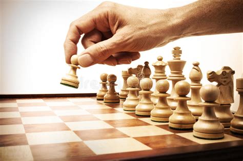 The current form of the game emerged in southern europe during the second half of the 15th century after evolving from similar, much older games of indian and persian origin. Business Strategy Chess Move Hand Stock Photo - Image of strategic, chess: 24128684
